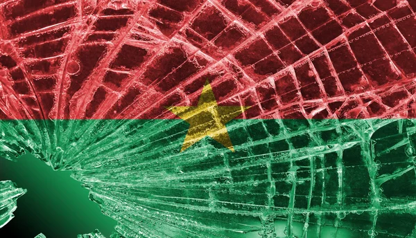 Gebroken glas of ijs met een vlag, burkina faso — Stockfoto