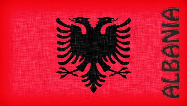 Vlag van Albanië gestikt met brieven — Stockfoto