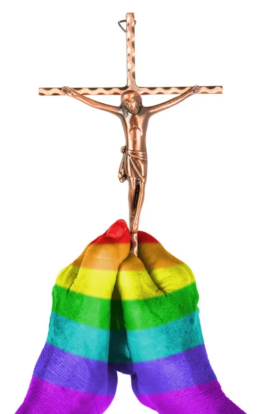 Old woman with catholic crucifix, isolated, rainbow flag pattern — Stock Photo, Image