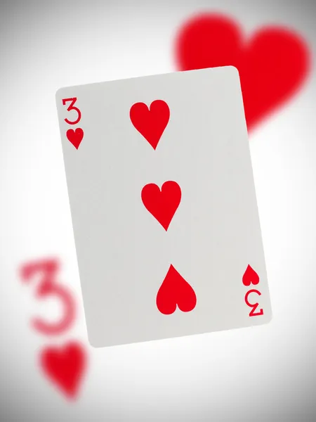 Spielkarte, drei Herzen — Stockfoto