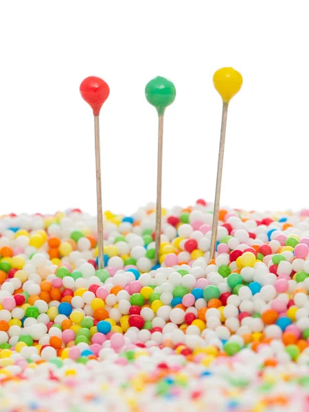 Straight pins in candy — Stock Photo, Image