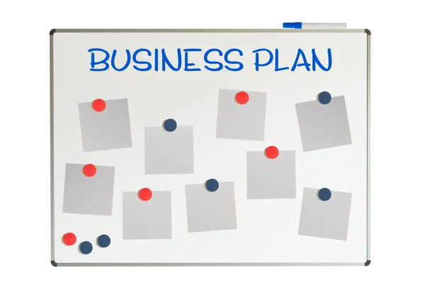 Plan de negocios con papeles e imanes vacíos en una pizarra blanca —  Fotos de Stock