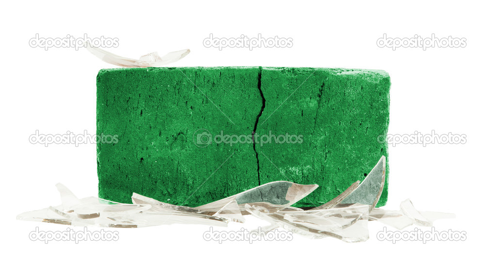 Brick with broken glass, violence concept