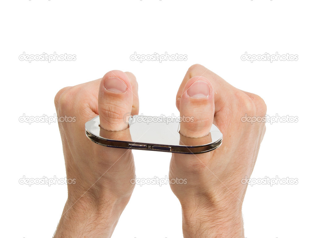 Adult hands in thumb cuffs isolated