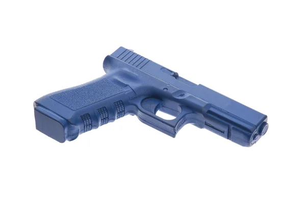 Brudny niebieski szkolenia pistolet na białym tle — Zdjęcie stockowe