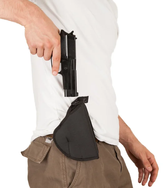 Närbild av en man med hölster och en pistol — Stockfoto