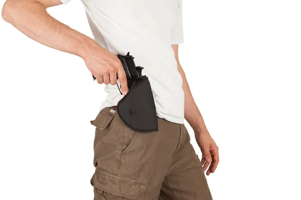 Detail člověka s pouzdra a zbraň — Stock fotografie
