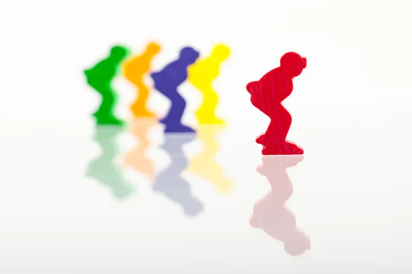 Five colored pawns isolated on a white background — Stock Photo, Image