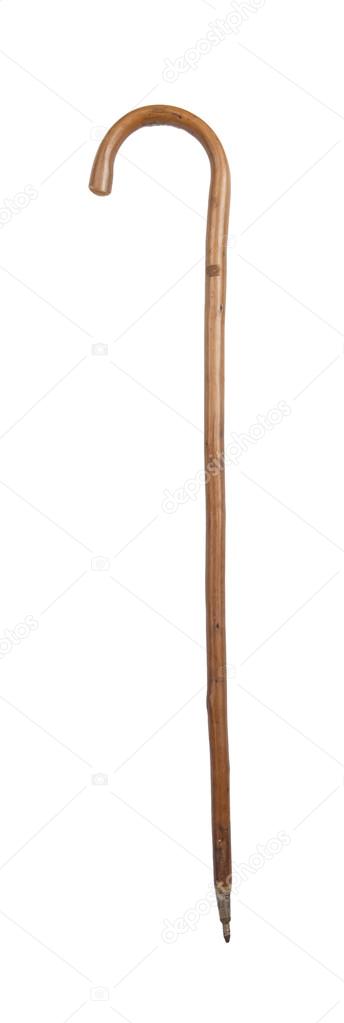 Old walking stick isolated on white