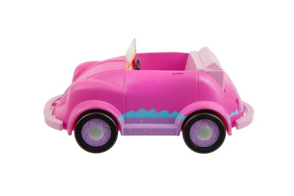 Oude roze plastic speelgoedauto — Stockfoto