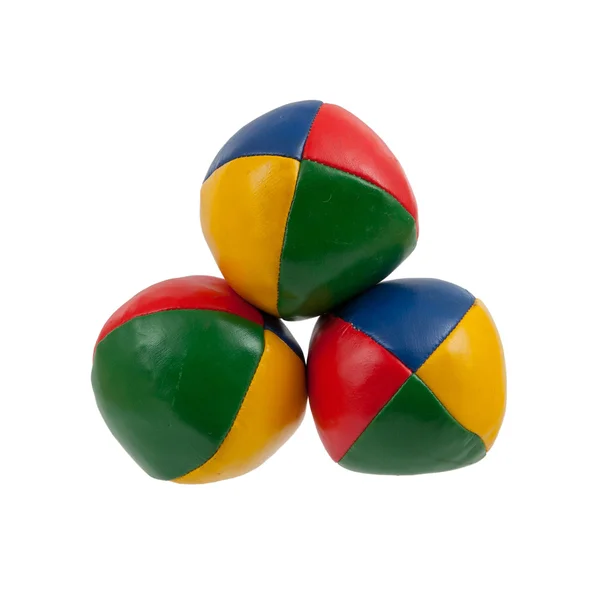 Tre jonglera bollar isolerade — Stockfoto