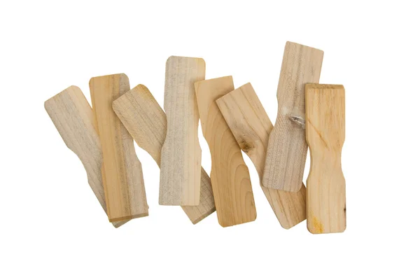 Eight small wooden spatulas — Stock Photo, Image