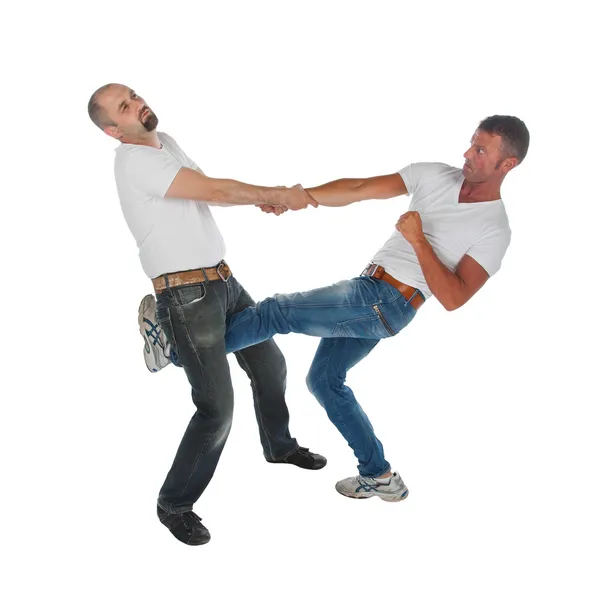 Чоловік намагається викрасти іншого чоловіка, самозахист, кидається в пах — стокове фото