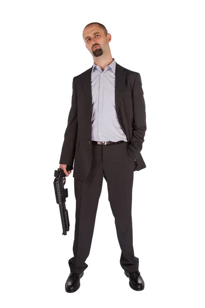 Mafia man is holding a shotgun — Stock Photo, Image