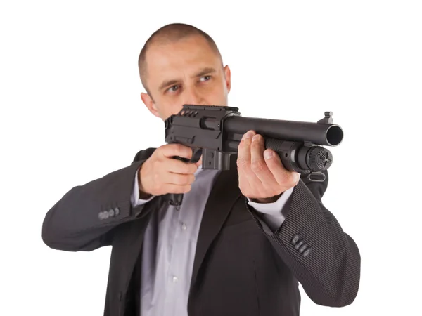 Mafia man is holding a shotgun — Stock Photo, Image