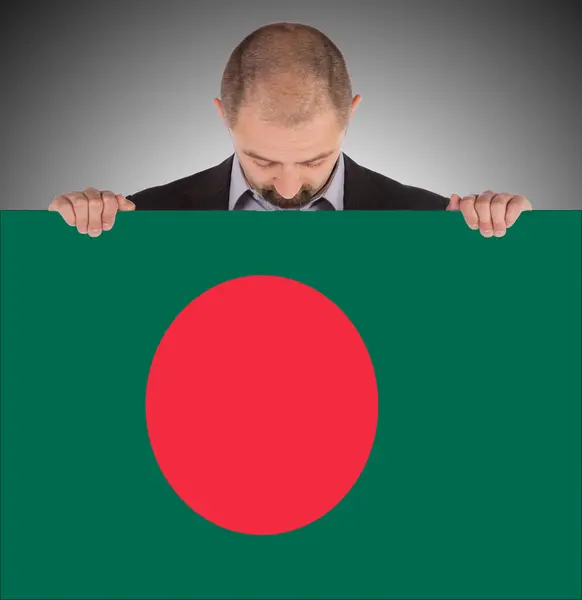 Zakenman met een grote kaart, vlag van bangladesh — Stockfoto