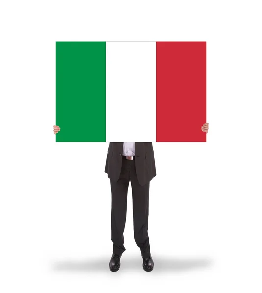 イタリアの旗の大きなカードを保持している実業家 — ストック写真