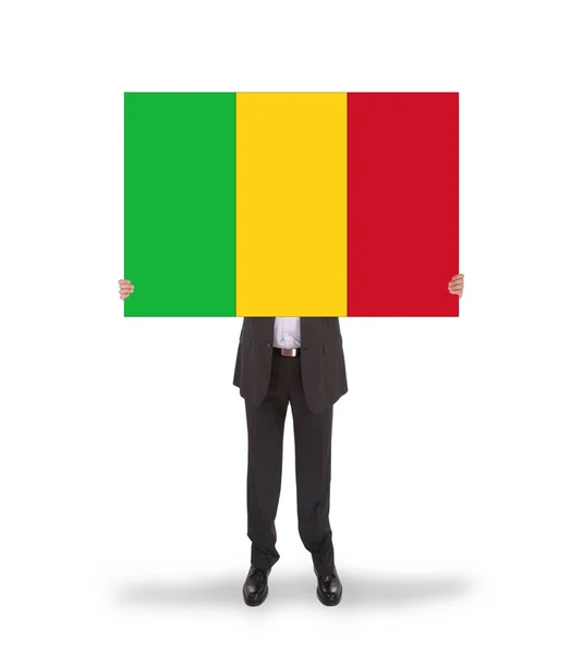 Empresário segurando um cartão grande, bandeira do Mali — Fotografia de Stock