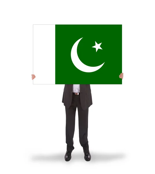Businessman holding a big card, flag of Pakistan — Stock Photo, Image