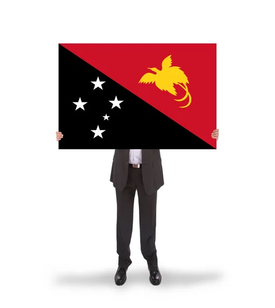 Geschäftsmann mit großer Karte, Flagge von Papua Neuguinea — Stockfoto