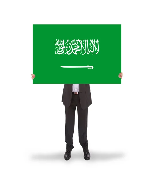 Businessman holding a big card, flag of Saudi Arabia — Stock Photo, Image