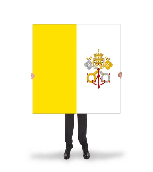 Biznesmen gospodarstwa duże karty, flaga Watykanu — Zdjęcie stockowe