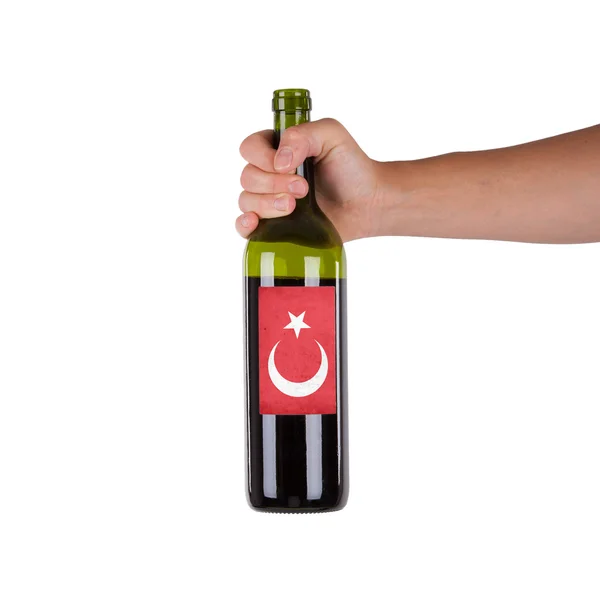 Elinde bir şişe kırmızı şarap ver — Stok fotoğraf