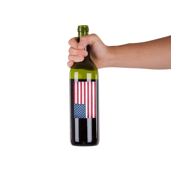 Tenendo in mano una bottiglia di vino rosso — Foto Stock