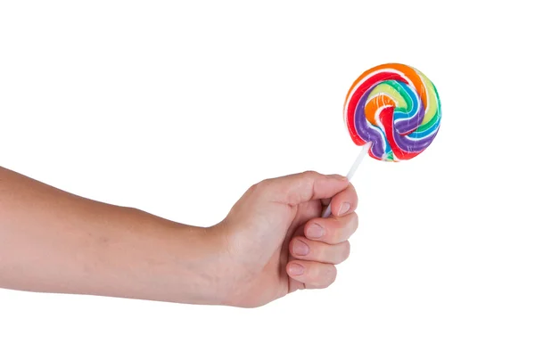 Lollipop in hand — Stock Photo, Image