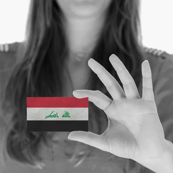 Woman showing a business card — Stock Photo, Image