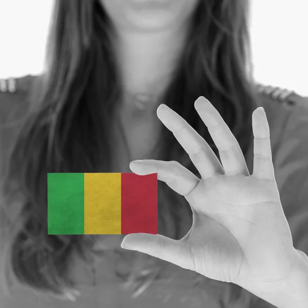 Woman showing a business card — Stock Photo, Image