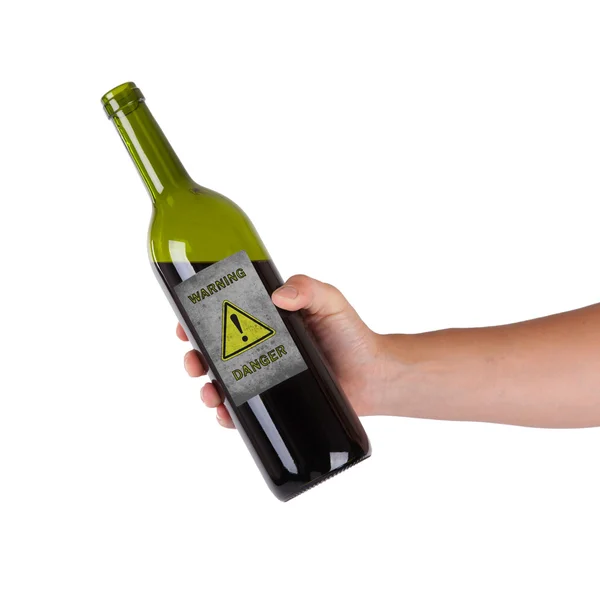 Hand som håller en flaska — Stockfoto