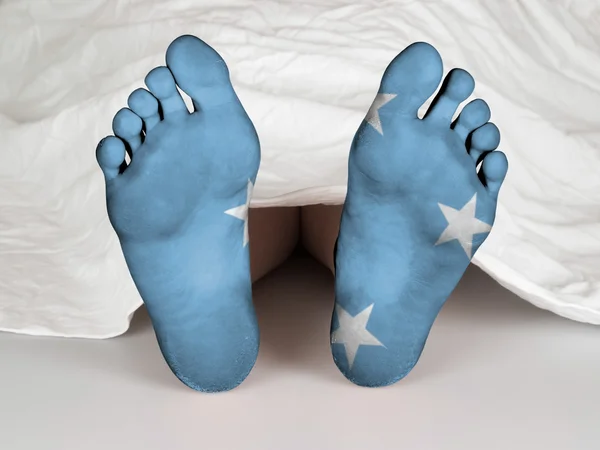 Feet with flag — Stock Photo, Image