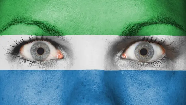 Close up of eyes with flag — Stock Photo, Image