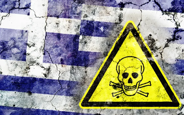 Old cracked wall with poison warning sign and painted flag — Stock Photo, Image