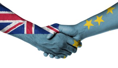 Erkek ve kadın el sıkışıyor.