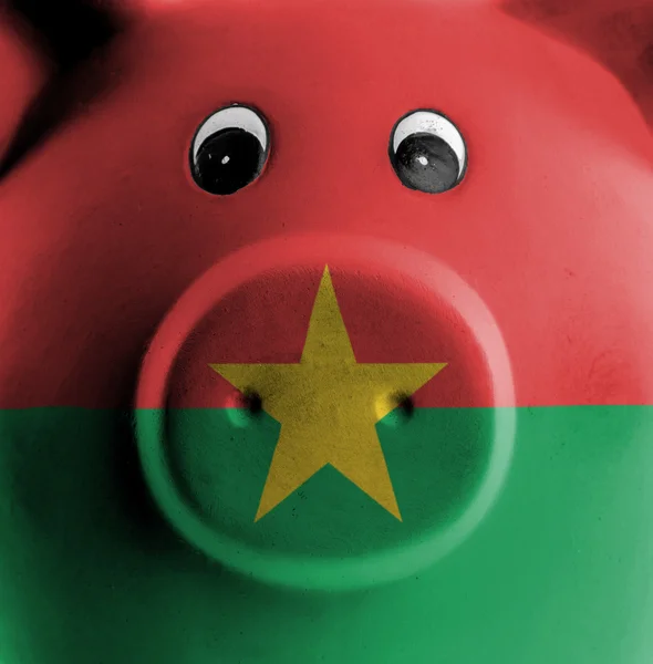 Ceramic piggy bank with painting of national flag — Stock Photo, Image