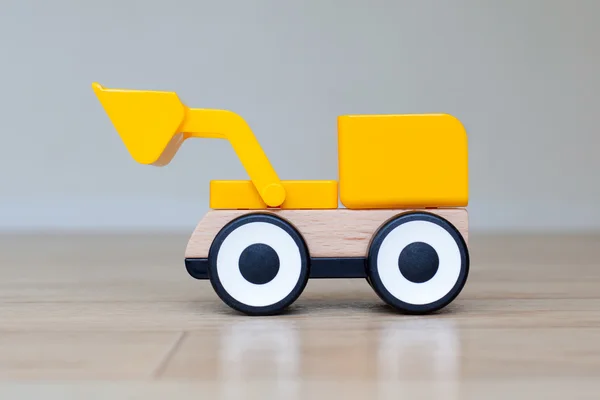 Brinquedo simples do dozer da roda — Fotografia de Stock