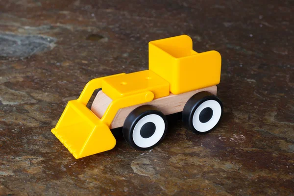 Simple wheel dozer toy — Stock Photo, Image