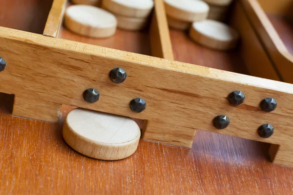 Típico juego de mesa de madera holandés - Sjoelen —  Fotos de Stock