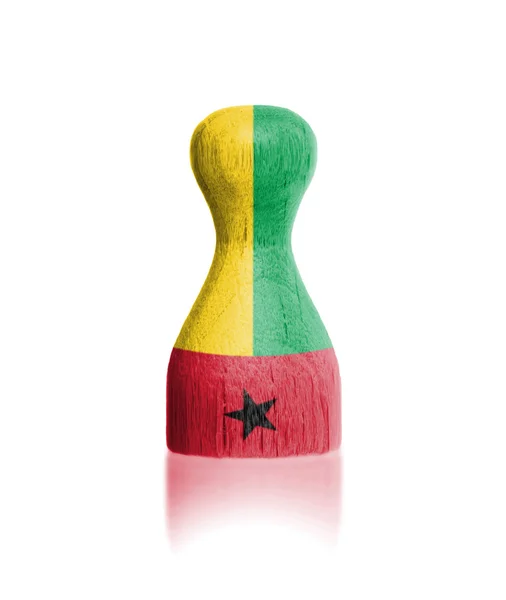 Wooden pawn with a flag painting — Stock Photo, Image