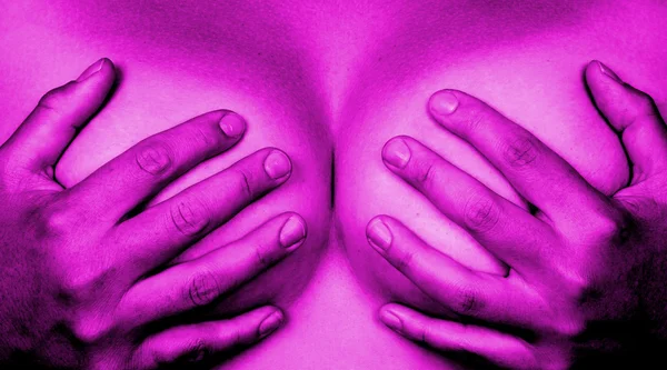 Hands covering breasts — Stock Photo, Image