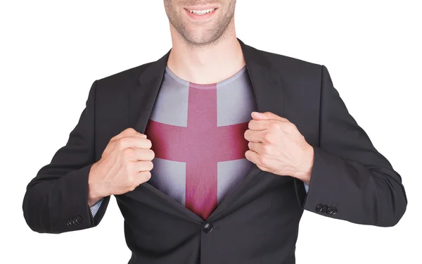 Hombre de negocios abriendo traje para revelar camisa con bandera —  Fotos de Stock