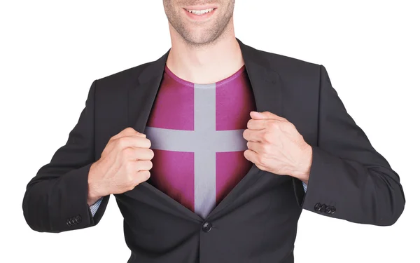 Zakenman opening pak te onthullen shirt met vlag — Stockfoto