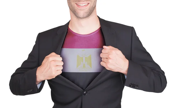 Hombre de negocios abriendo traje para revelar camisa con bandera — Foto de Stock