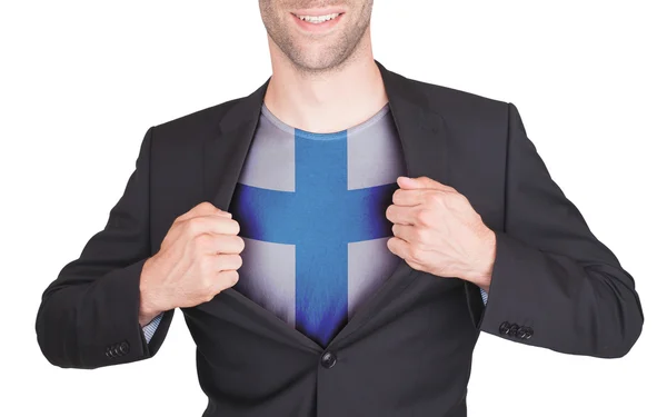 Hombre de negocios abriendo traje para revelar camisa con bandera — Foto de Stock