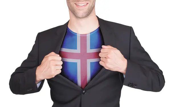 Hombre de negocios abriendo traje para revelar camisa con bandera — Foto de Stock