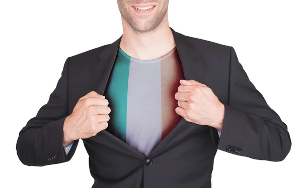 Hombre de negocios abriendo traje para revelar camisa con bandera —  Fotos de Stock