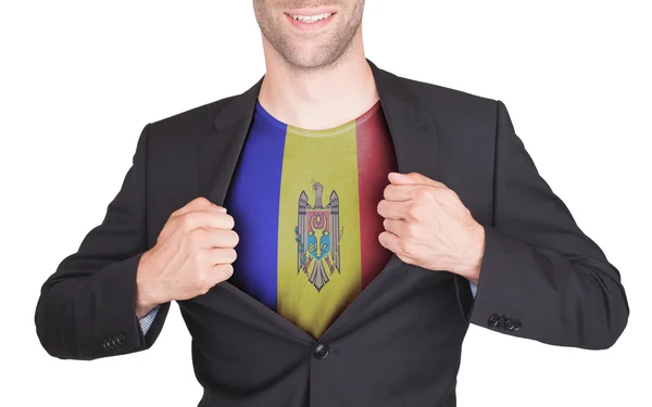 Businessman opening suit to reveal shirt with flag — Stock Photo, Image