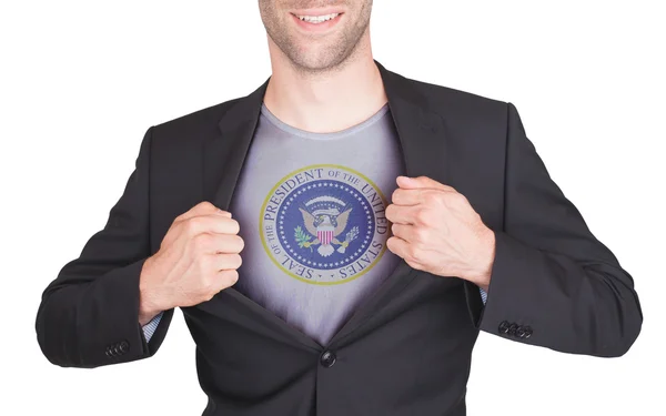 Businessman opening suit to reveal shirt — Stock Photo, Image
